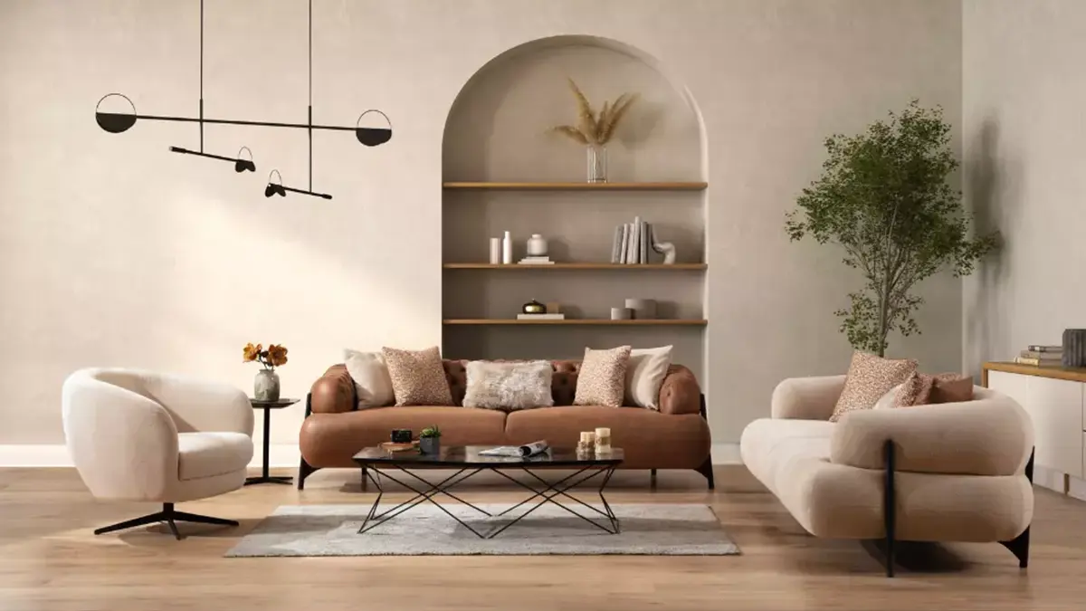 moderan braon trosded u kombinaciji sa krem dvosedom i foteljom, te neobičnim klub stolom.